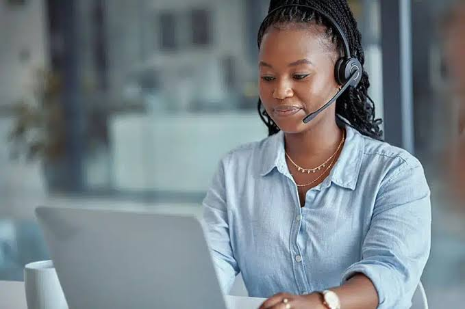 Customer experience agent wearing a headset