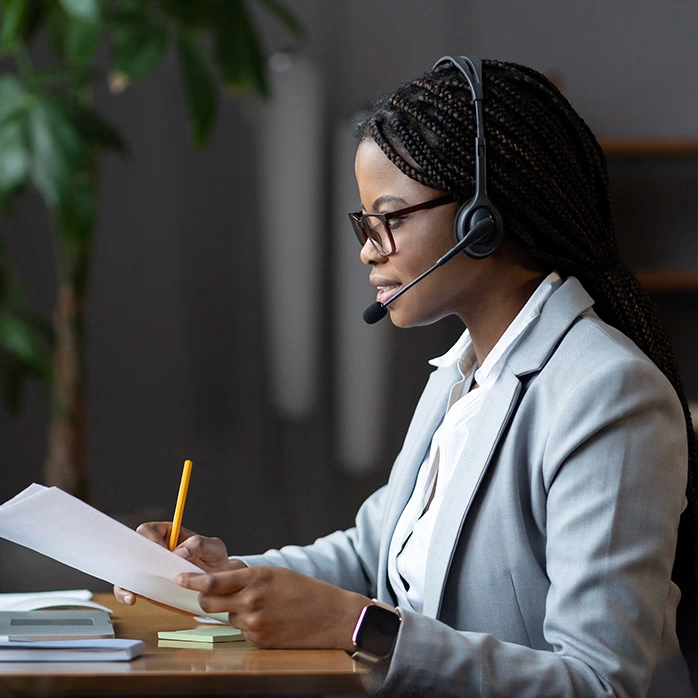 Back office specialist working at a computer